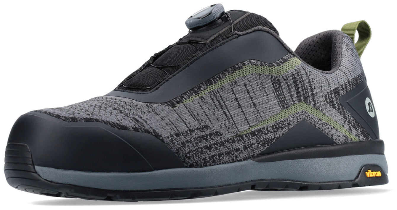 The shoe is sporty and modern, with a gray surface and black, textured details. It features a non-slip sole and a lightweight design with a quick-lacing system.