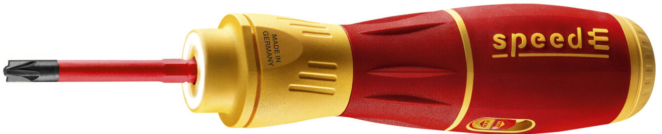 The image shows a screwdriver with a red handle and a golden upper part. The blade is black with a flat tip, ideal for driving screws. The handle is non-slip.