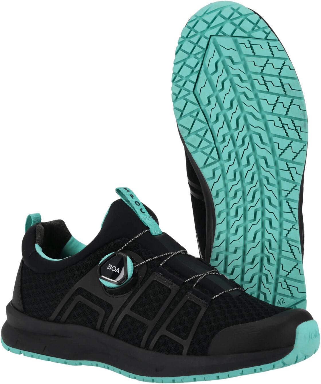 The image shows a sporty shoe in black with mint green accents. The sole features a grippy pattern. A special lacing system is visible in the center. The shoe appears lightweight and dynamic.