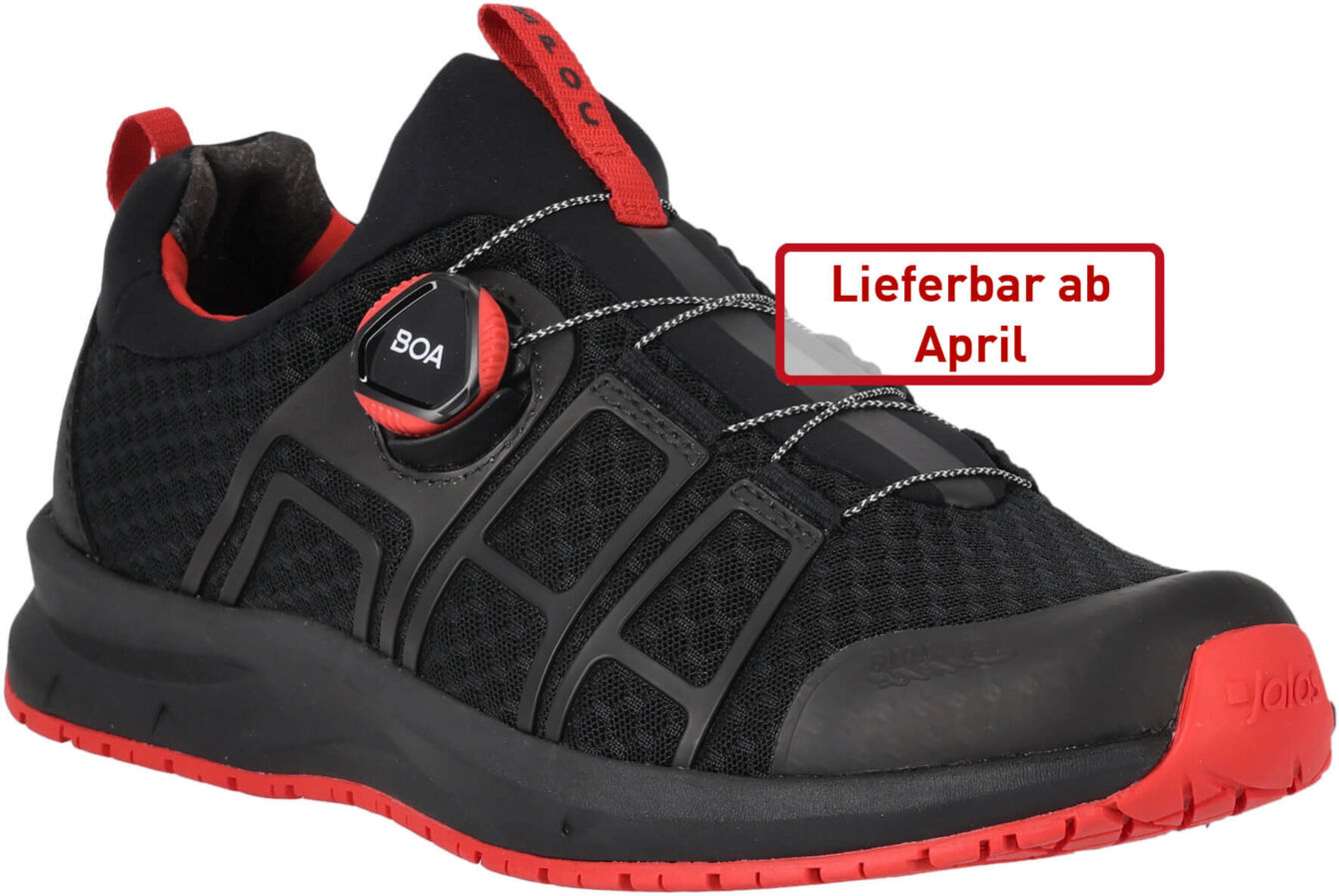 The shoe is black with red accents. It has a modern design, quick lacing, and a grippy sole. A note indicates that it will be available from April.