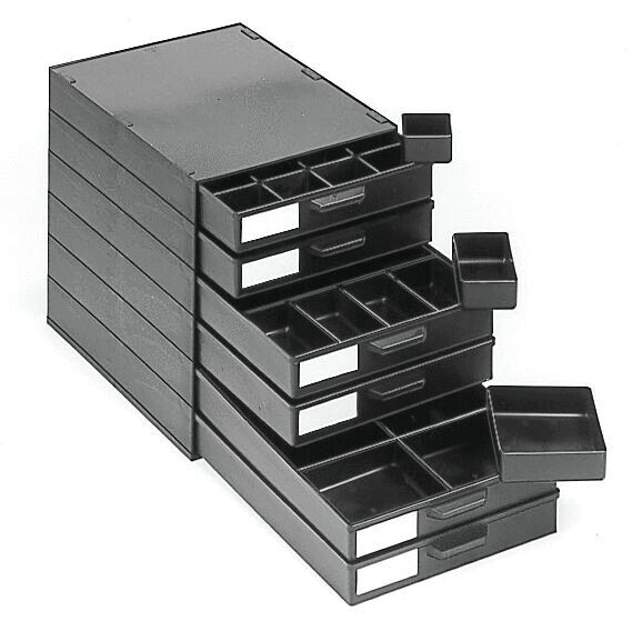 The image shows a black organizer with multiple drawers. The drawers vary in size and have rectangular compartments. Some are open, others are labeled.