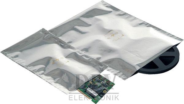 The image displays a small circuit board in the lower left corner, surrounded by two silver foil bags and a black coil on the right side of the picture.