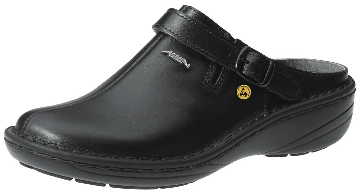 The image shows a black leather clog with a curved shape. It features a wide, adjustable strap and a lightweight, textured sole for good grip.