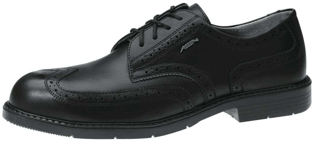 The shoe is a black, classic lace-up made of smooth leather. It features fine, perforated details on the side and a flat, non-slip sole. Ideal for formal occasions.