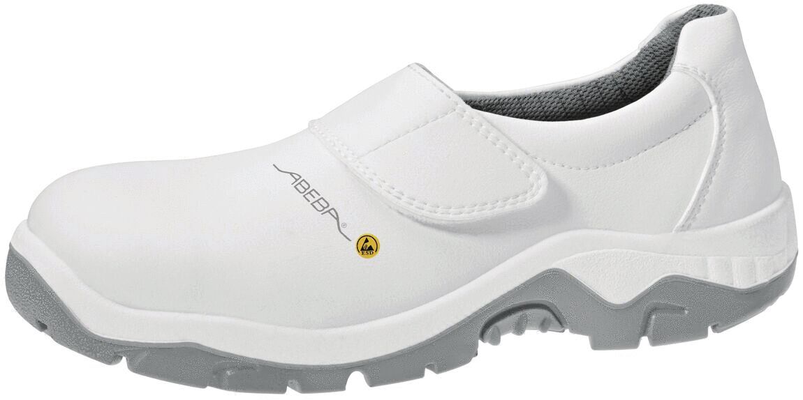 The shoe is white, made from smooth material, with elastic inserts and a gray sole. It has a sturdy, non-slip outer sole for good grip. Ideal for everyday professional use.