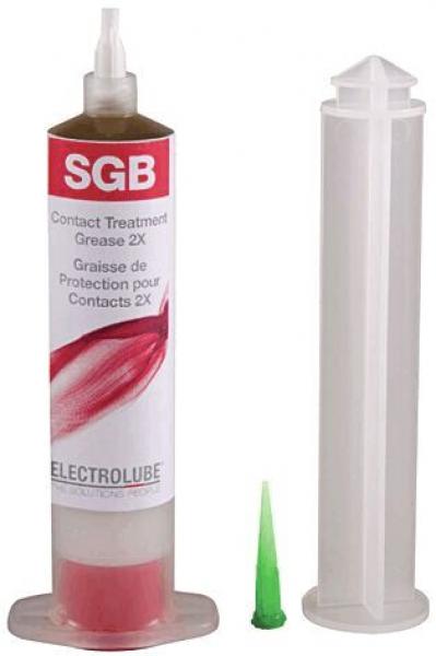 The image shows a tube of red contact treatment grease labeled "SGB". Next to it is a transparent plastic container and a green tip.