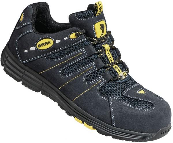 The shoe is black with yellow accents. It has a sporty, padded shape and a grippy sole. The upper area is made from a mix of fabric and leather with mesh material for ventilation.